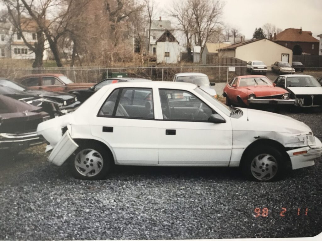 wrecked Dodge Shadow