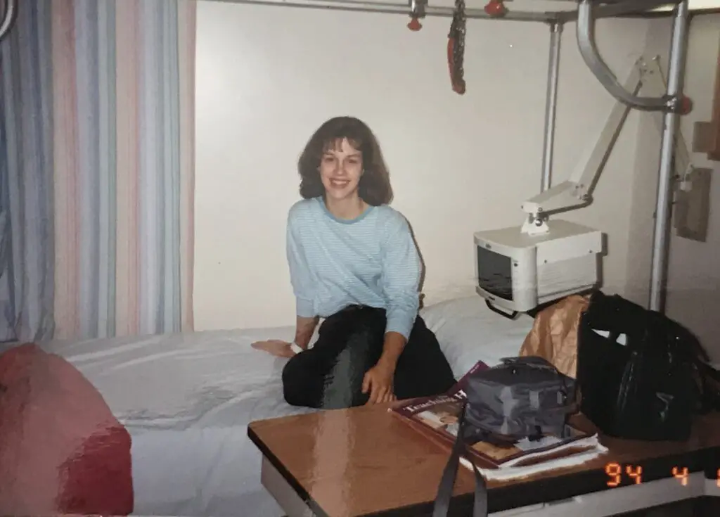 Kristen in a hospital bed in 1994