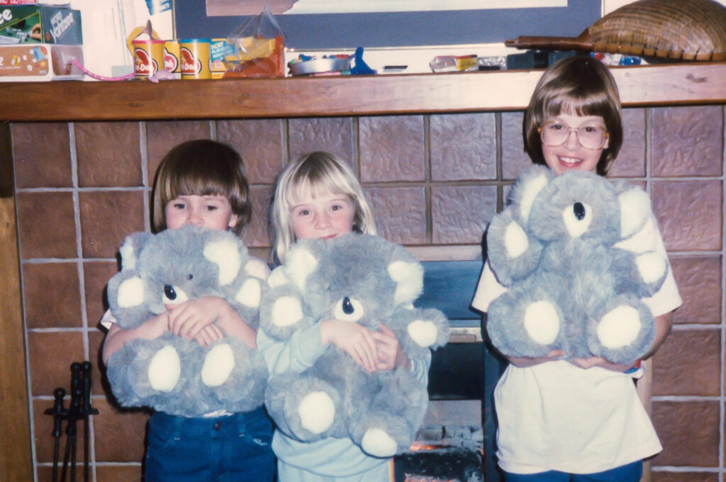 Kristen as a kid with glasses