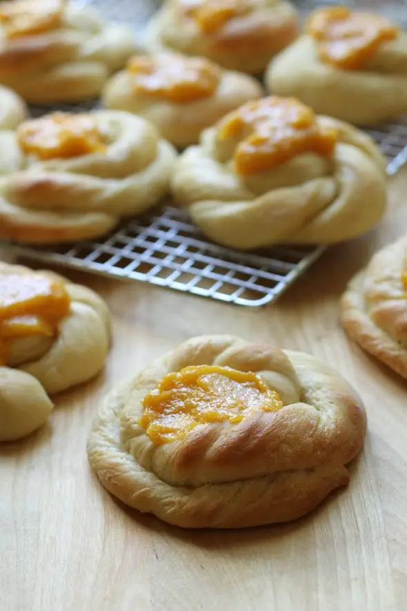 Apricot sweet rolls cooling on a rack